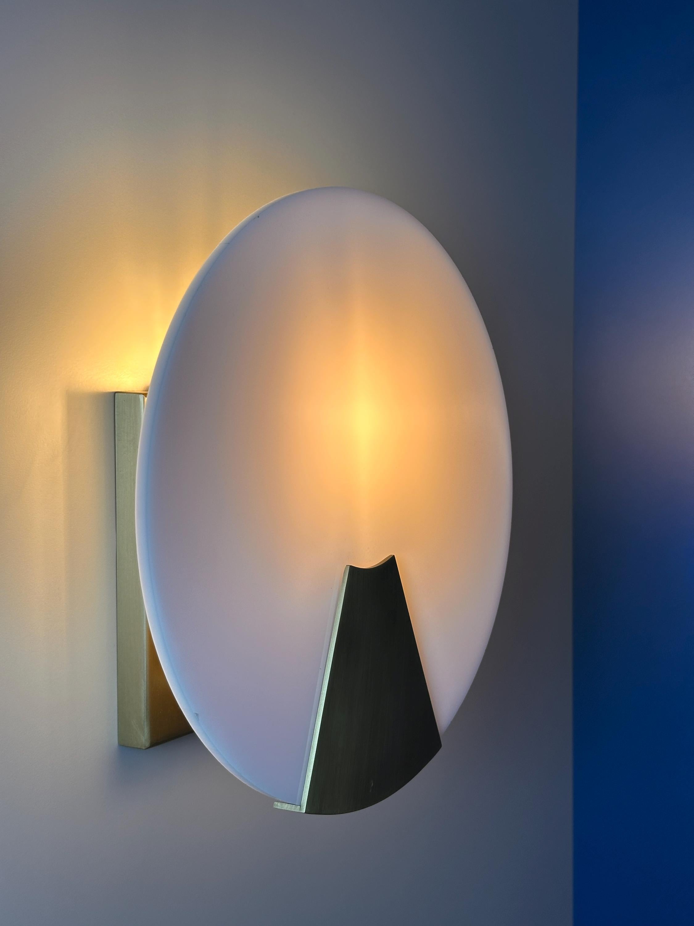 Bradley Wall Sconce – Modern Metal Accent Fixture with Soft Ambient Glow