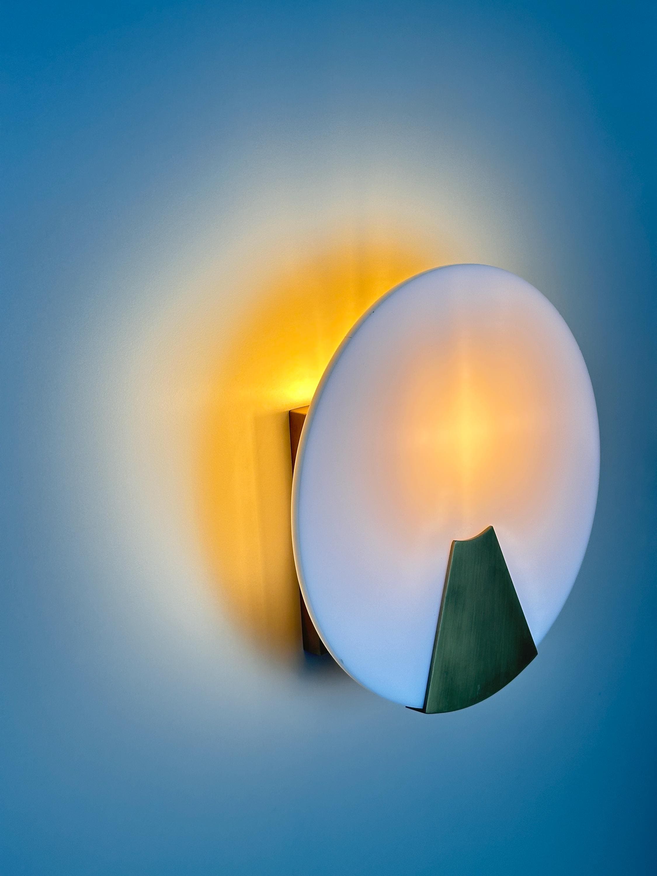 Bradley Wall Sconce – Modern Metal Accent Fixture with Soft Ambient Glow