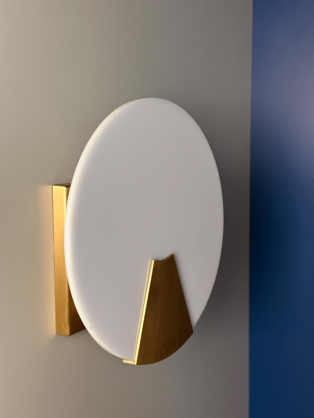 Bradley Wall Sconce – Modern Metal Accent Fixture with Soft Ambient Glow