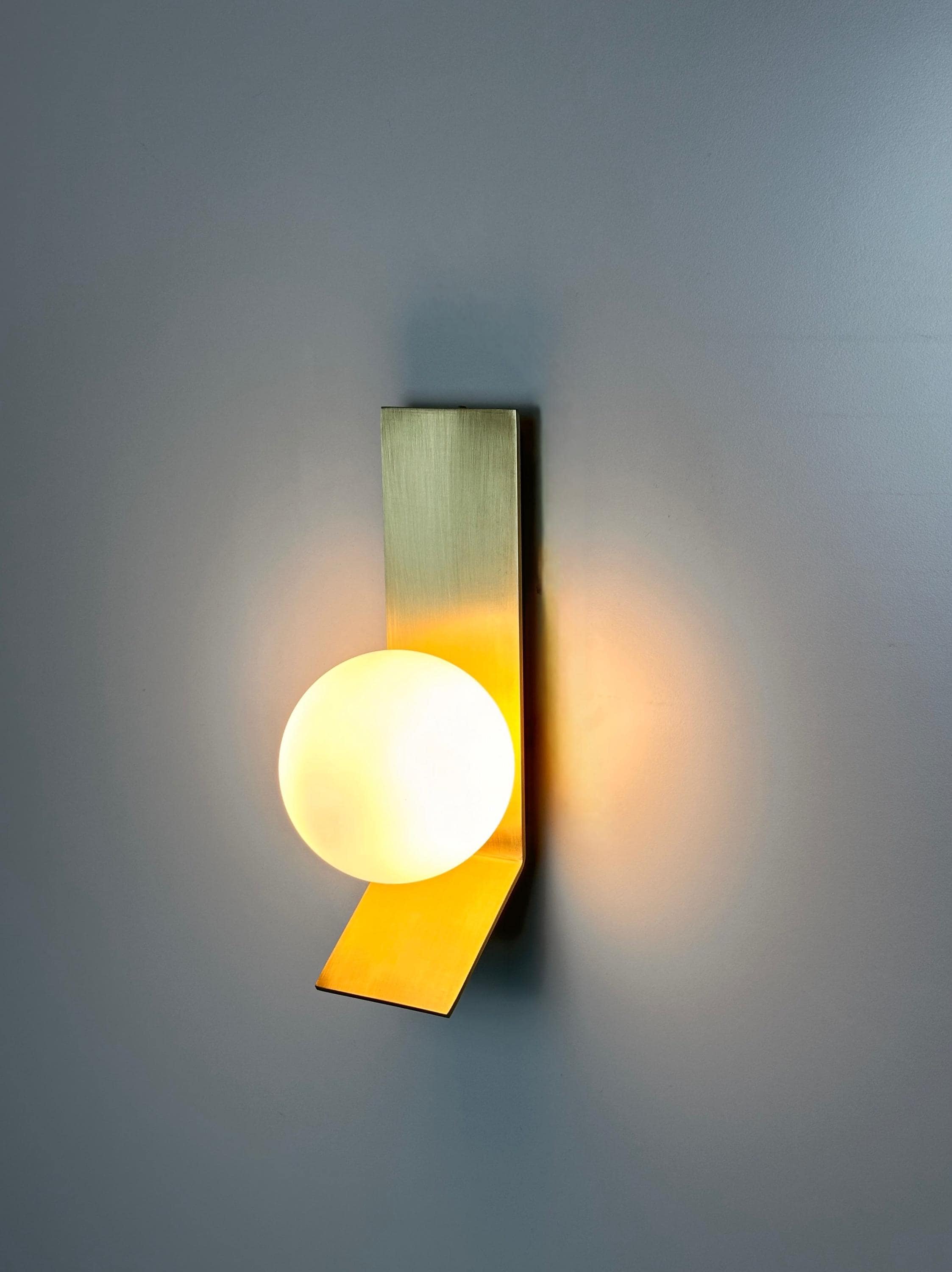 Tetragone Wall Sconce: Modern Brushed Brass with Frosted Glass Globe