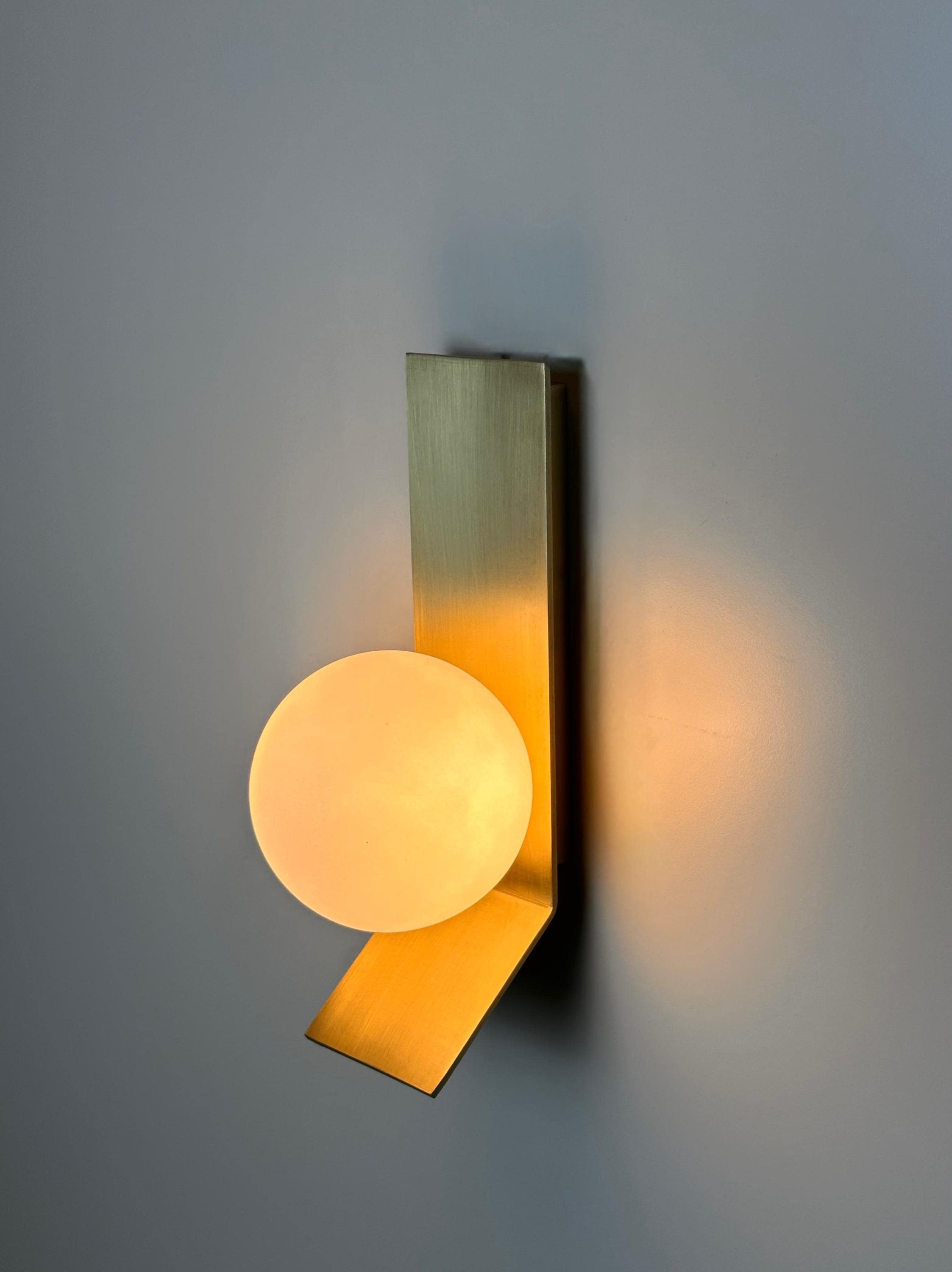 Tetragone Wall Sconce: Modern Brushed Brass with Frosted Glass Globe