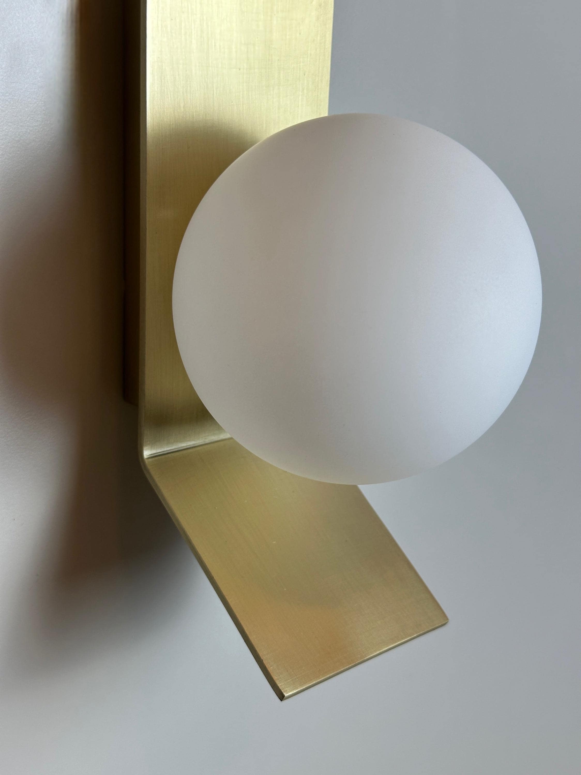 Tetragone Wall Sconce: Modern Brushed Brass with Frosted Glass Globe