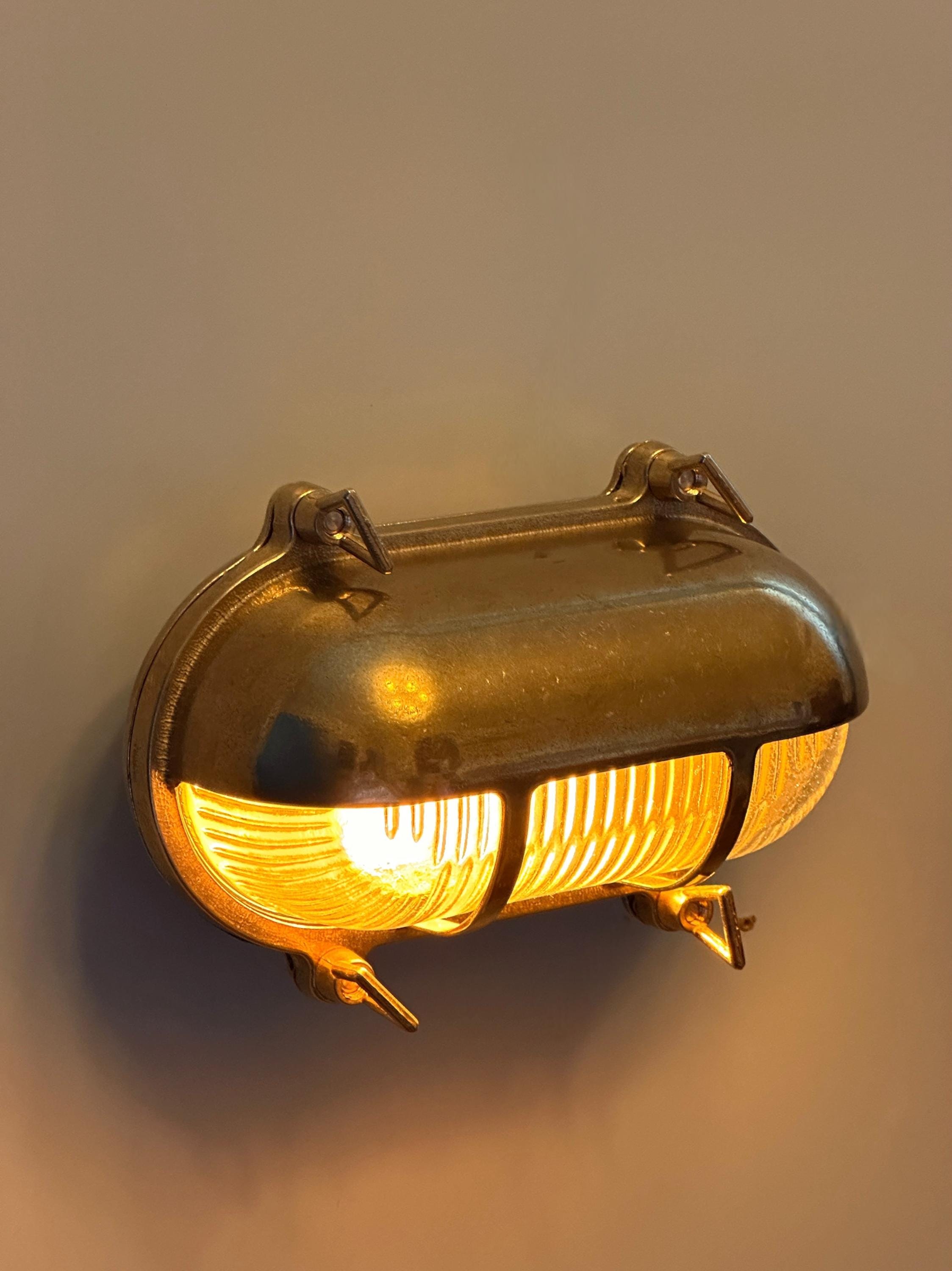 Gnarp Brass Outdoor Wall Sconce – Nautical Bulkhead Light with Ribbed Glass