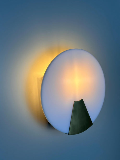Bradley Wall Sconce – Modern Metal Accent Fixture with Soft Ambient Glow