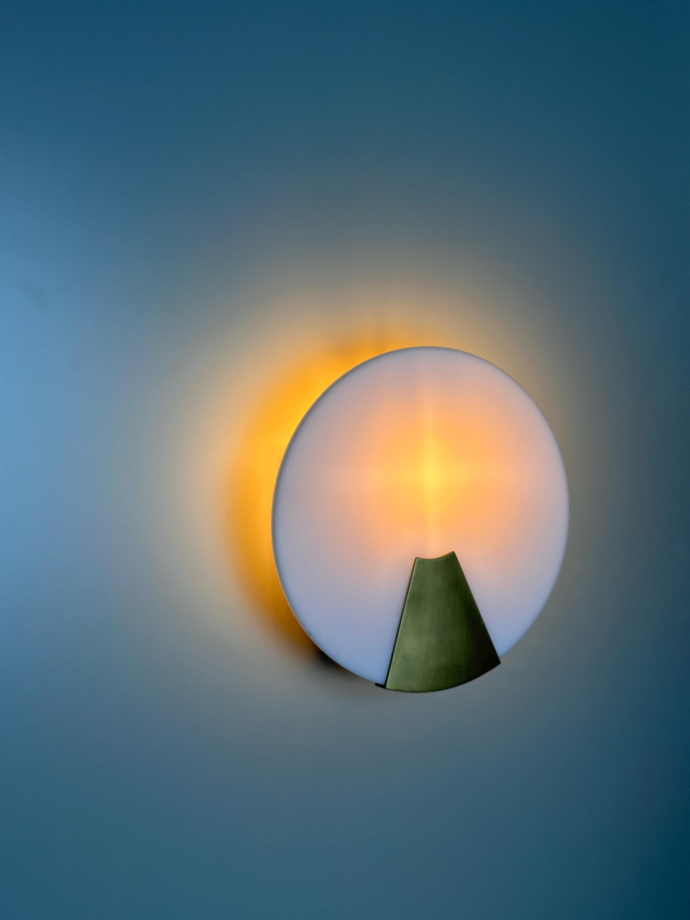 Bradley Wall Sconce – Modern Metal Accent Fixture with Soft Ambient Glow