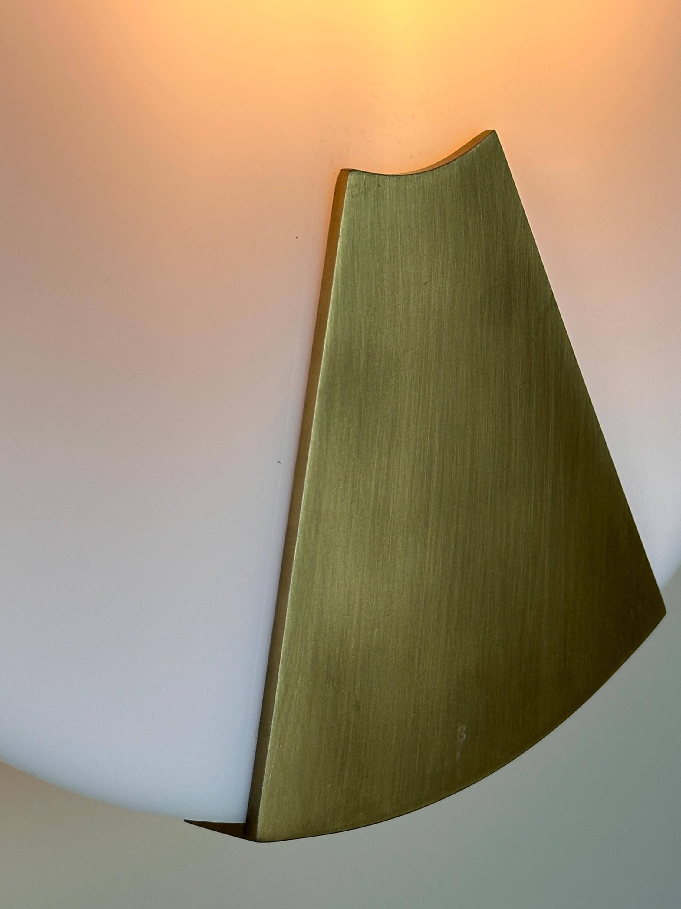 Bradley Wall Sconce – Modern Metal Accent Fixture with Soft Ambient Glow