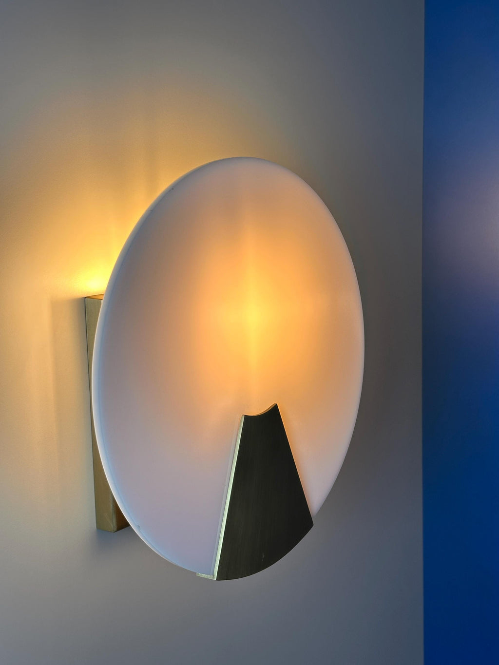 Bradley Wall Sconce – Modern Metal Accent Fixture with Soft Ambient Glow