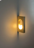 Ecowa Wall Sconce – Minimalist Brass Accent Fixture with Warm Ambient Glow