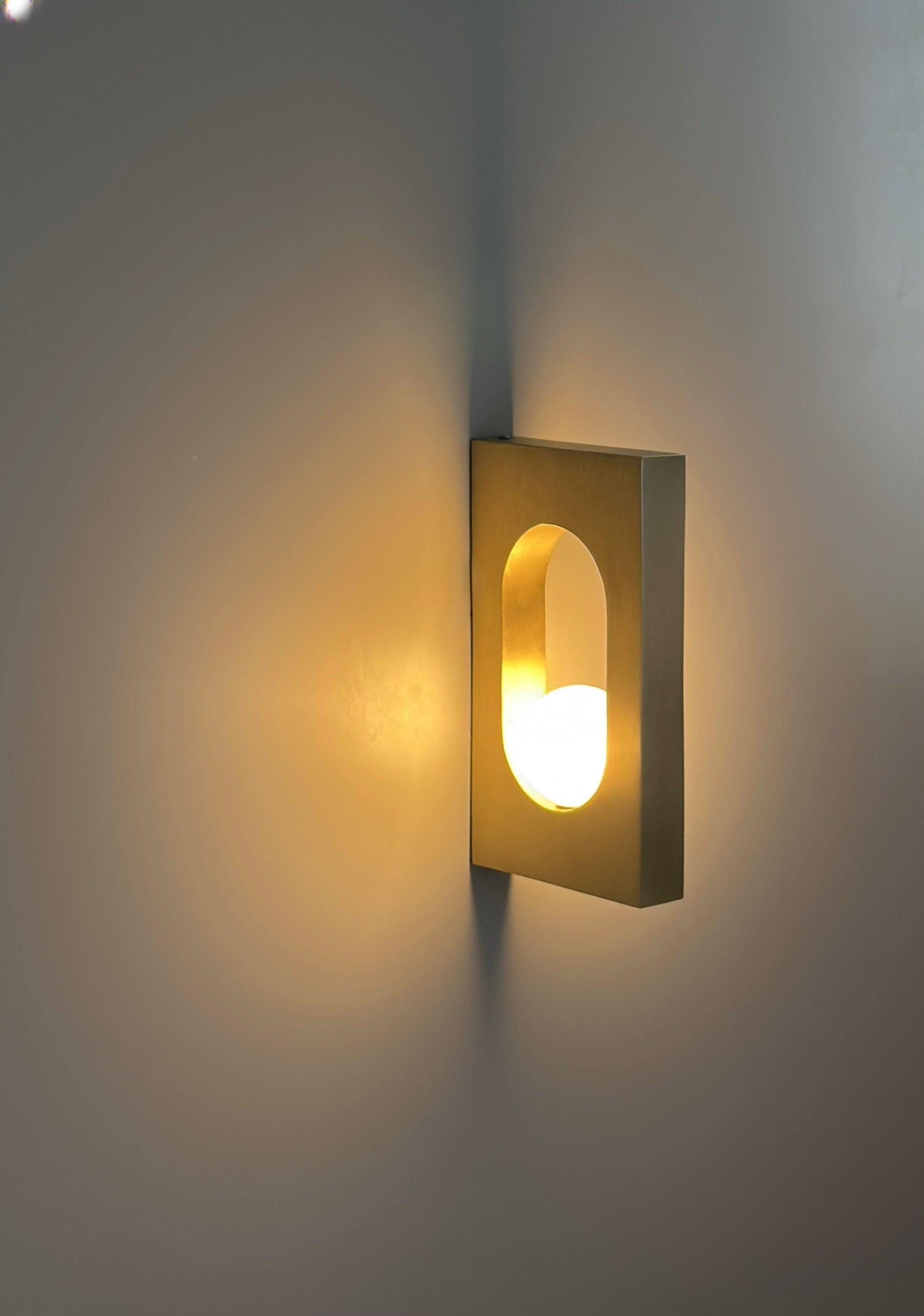 Ecowa Wall Sconce – Minimalist Brass Accent Fixture with Warm Ambient Glow