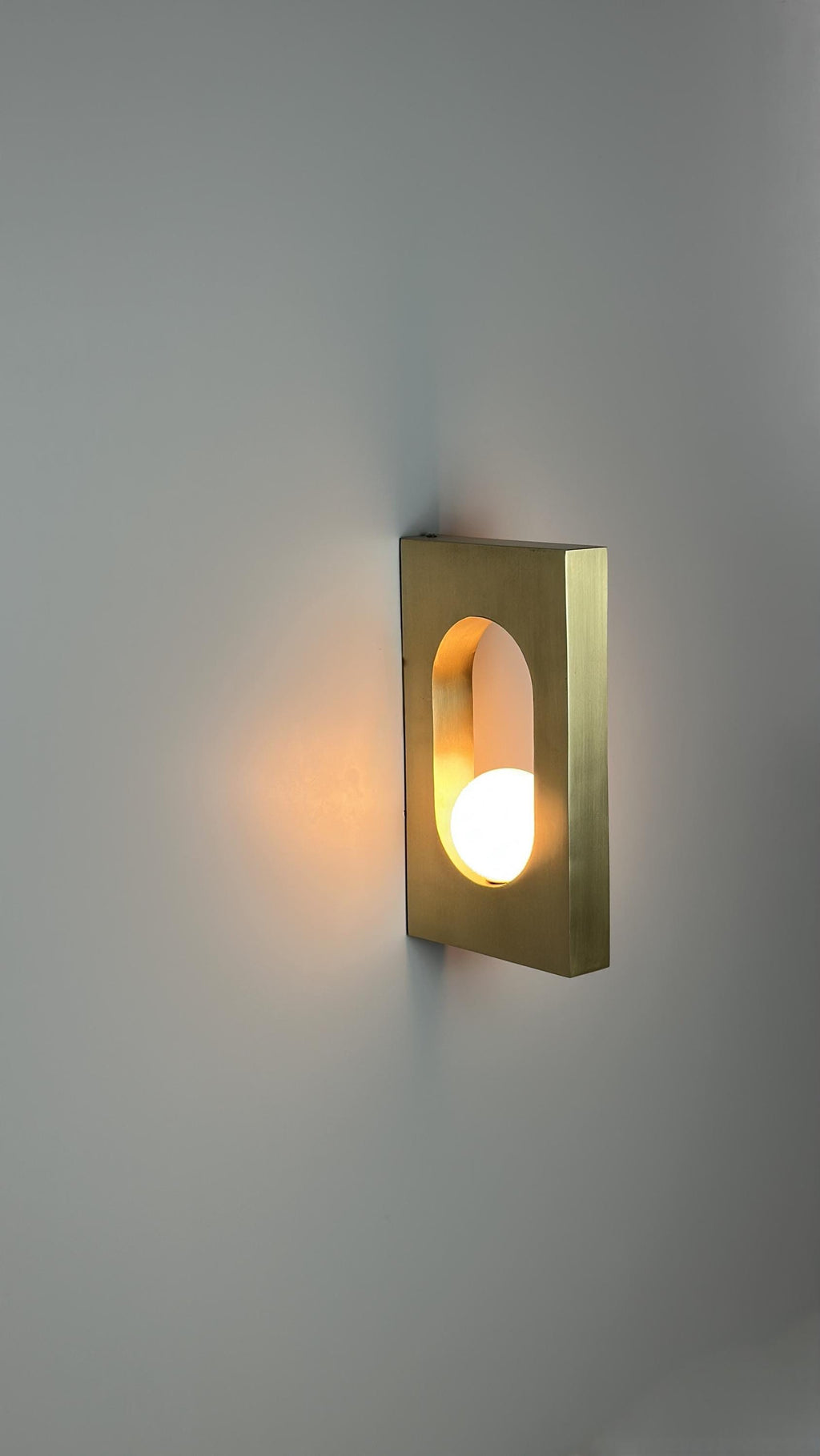 Ecowa Wall Sconce – Minimalist Brass Accent Fixture with Warm Ambient Glow