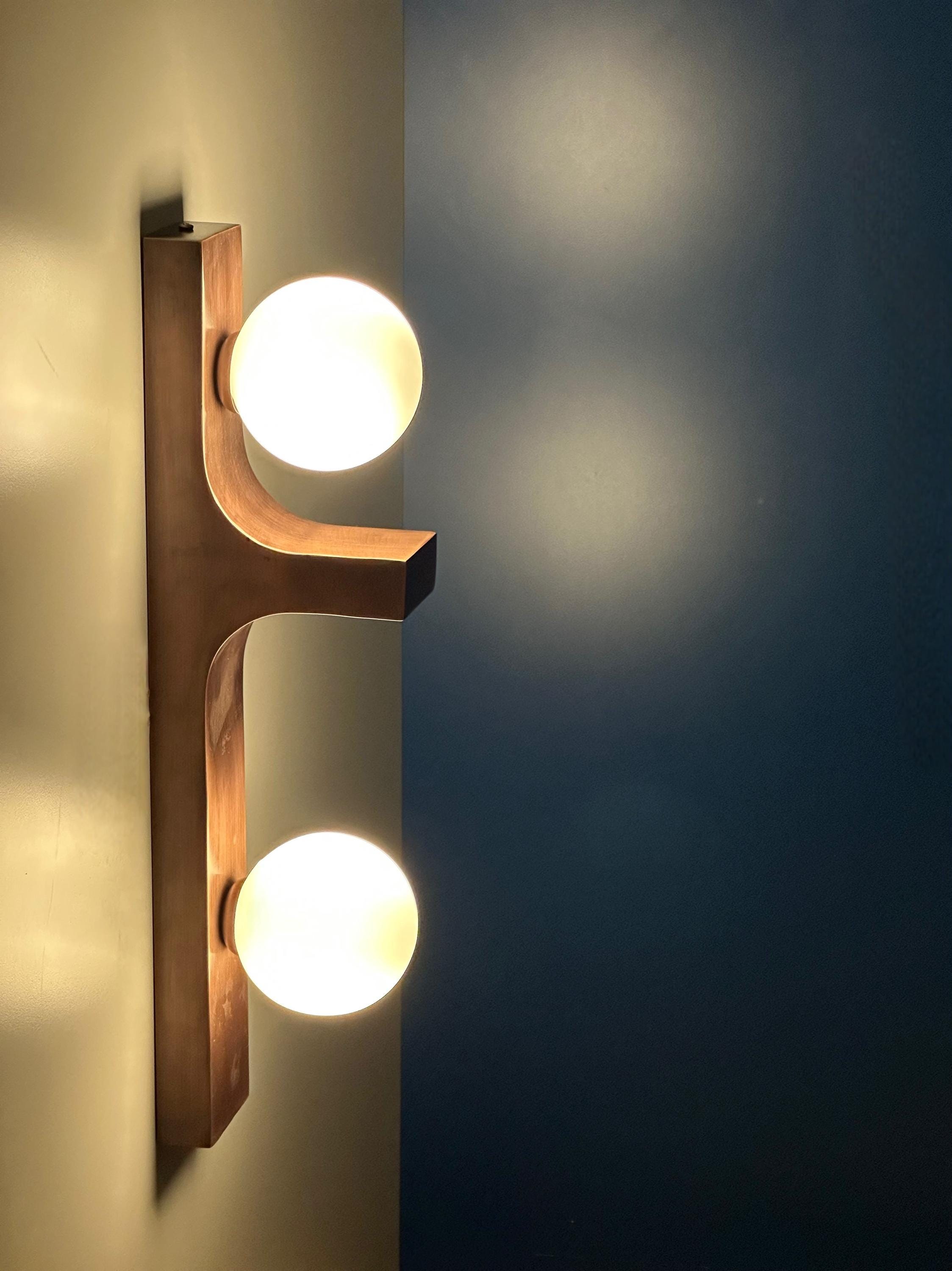 Macrom Brass Wall Sconce, Modern Designer Interior Wall Light with Double Glass Globes